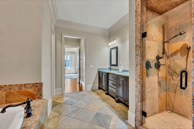 bathroom with crown molding, stone tile floors, a stall shower, vanity, and baseboards