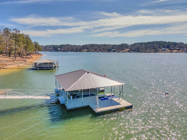 view of dock featuring a water view and boat lift