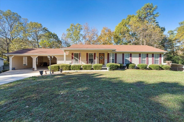 single story home with a front lawn, covered porch, and a carport