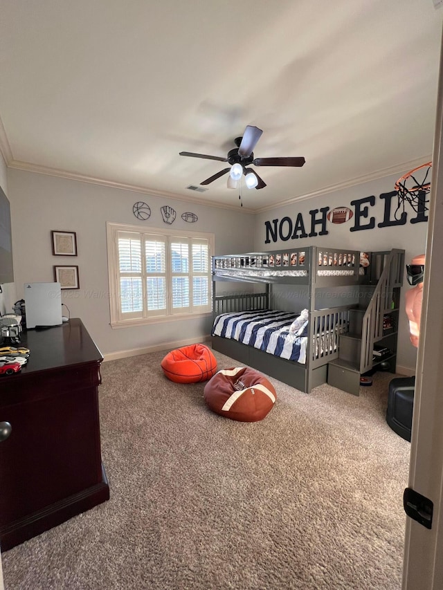 bedroom featuring ceiling fan, carpet, and crown molding