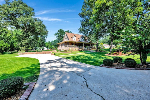 view of front of property with a front lawn and a porch