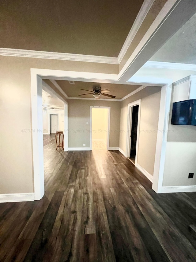 hall featuring crown molding and dark hardwood / wood-style floors