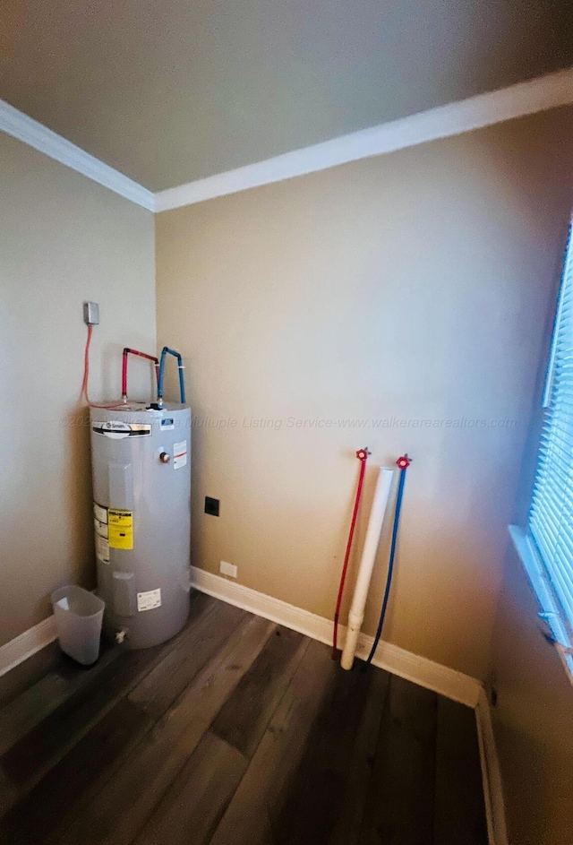 utility room featuring electric water heater