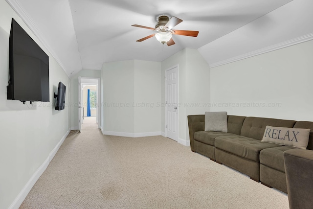 unfurnished living room featuring ceiling fan, light colored carpet, and vaulted ceiling