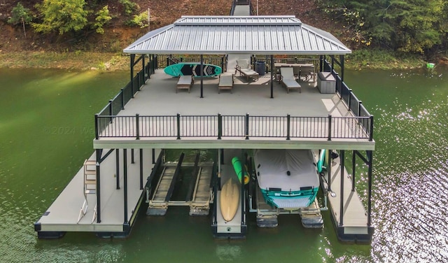 dock area with a water view