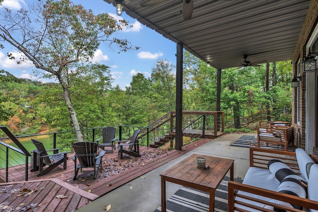 view of patio / terrace with outdoor lounge area, ceiling fan, and a deck