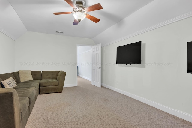 living room with light colored carpet, vaulted ceiling, and ceiling fan