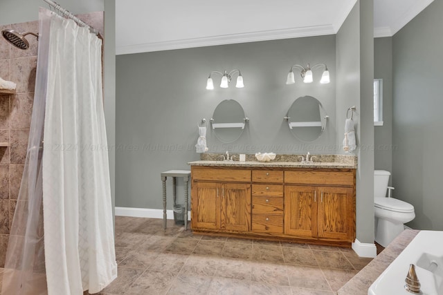 bathroom with vanity, crown molding, a shower with shower curtain, and toilet