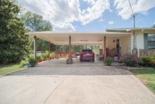 view of front of home with concrete driveway