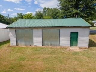 view of outbuilding with an outbuilding