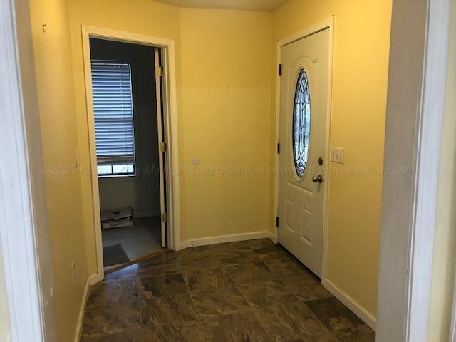 entrance foyer featuring baseboards