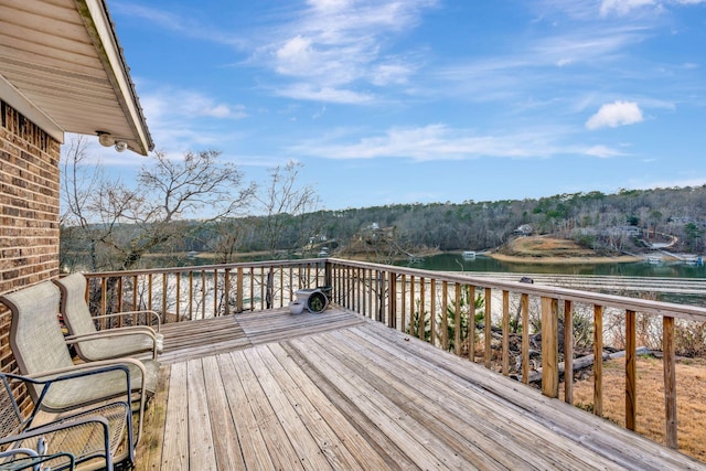 wooden deck with a water view