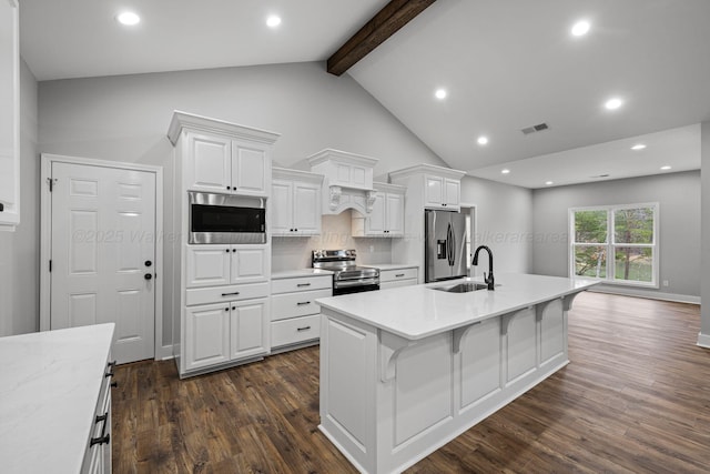 kitchen featuring white cabinets, a sink, appliances with stainless steel finishes, and visible vents