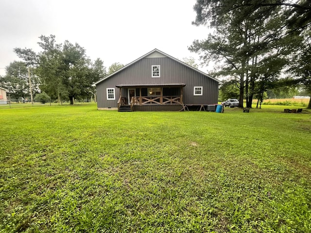 4694 County Road 1718, Holly Pond, AL 35083 - back of property featuring a lawn and a wooden deck