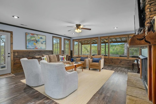 living area with ceiling fan, wood finished floors, visible vents, and recessed lighting