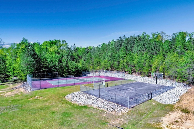 187 S Pointe Dr, Arley, AL 35541 - view of tennis court featuring a forest view