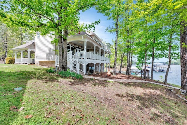 187 S Pointe Dr, Arley, AL 35541 - back of house featuring a water view, a lawn, and a porch