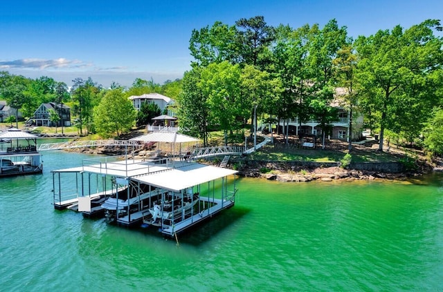 187 S Pointe Dr, Arley, AL 35541 - dock with boat lift, a water view, and view of scattered trees