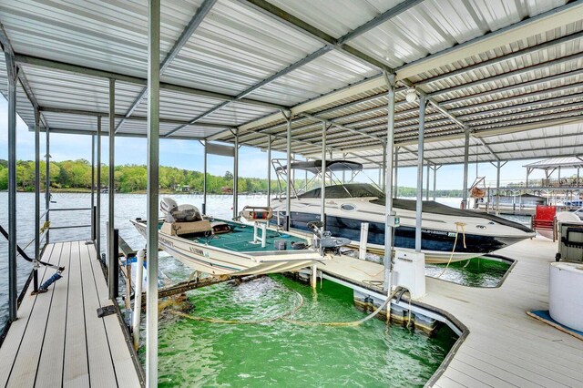 187 S Pointe Dr, Arley, AL 35541 - dock area featuring boat lift and a water view