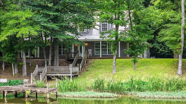 526 Boat Launch Rd, Quinton, AL 35130 - rear view of property featuring a yard, a deck with water view, a metal roof, and stairs