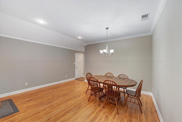 526 Boat Launch Rd, Quinton, AL 35130 - dining space featuring crown molding, light wood finished floors, a chandelier, recessed lighting, and lofted ceiling