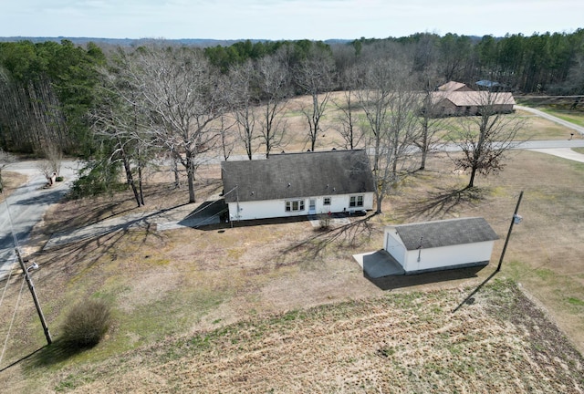 aerial view with a wooded view