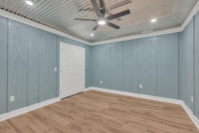 empty room with light wood-style floors, wood ceiling, a ceiling fan, and recessed lighting