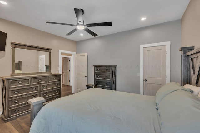 bedroom with dark wood-type flooring, recessed lighting, and ceiling fan