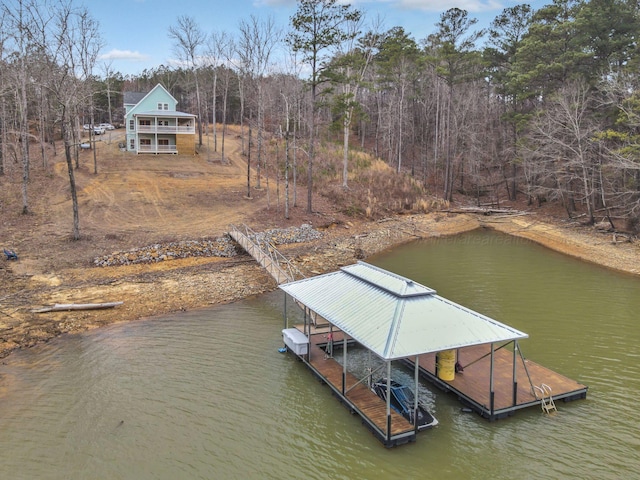 view of dock with a water view and boat lift