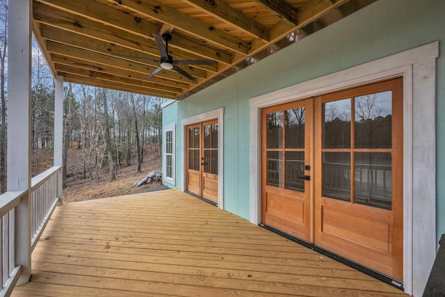 wooden deck with french doors and ceiling fan