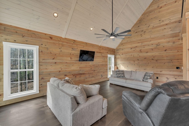 living area with wooden walls, wood ceiling, ceiling fan, dark wood-style flooring, and high vaulted ceiling