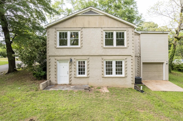 409 W 13th St, Jasper, AL 35501 - view of front of home with a front yard and a garage