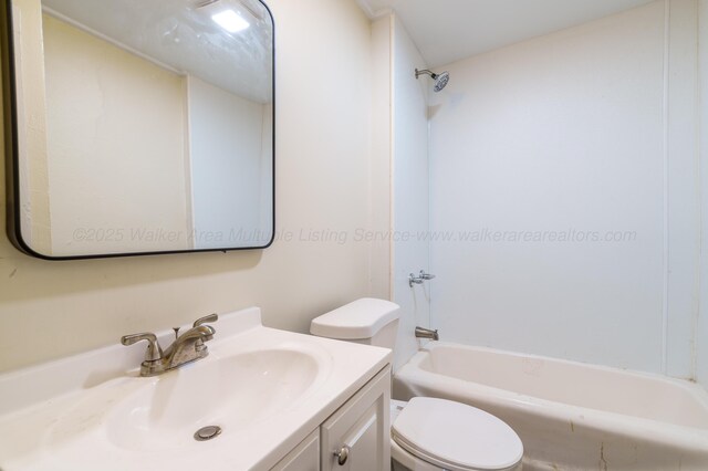 409 W 13th St, Jasper, AL 35501 - bathroom with vanity, toilet, and shower / washtub combination