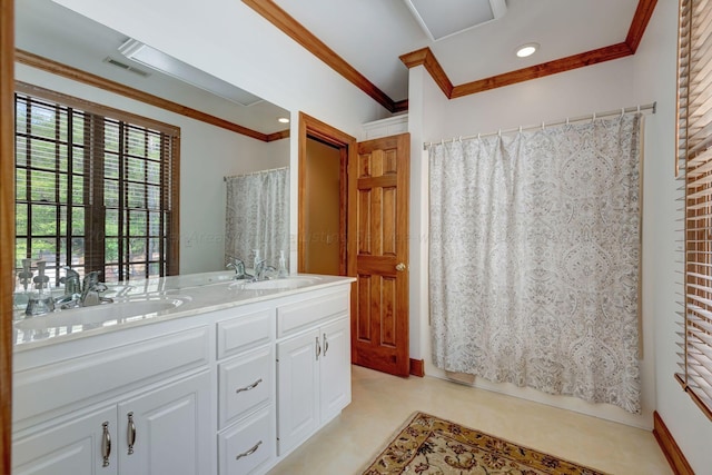 bathroom featuring recessed lighting, visible vents, crown molding, and double vanity