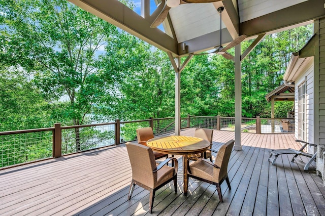 deck featuring outdoor dining area
