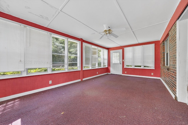 3209 Elm St, Adamsville, AL 35005 - unfurnished sunroom featuring ceiling fan and carpet