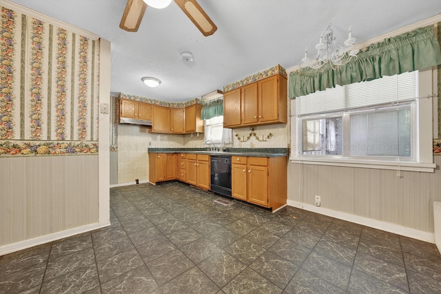 3209 Elm St, Adamsville, AL 35005 - kitchen featuring dishwasher, dark countertops, a ceiling fan, brown cabinetry, and under cabinet range hood
