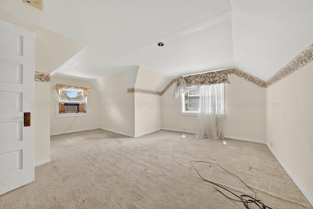 3209 Elm St, Adamsville, AL 35005 - additional living space with cooling unit, carpet floors, healthy amount of natural light, and lofted ceiling
