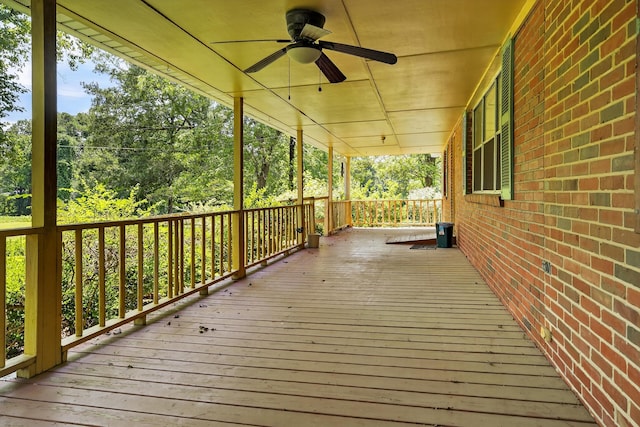 3209 Elm St, Adamsville, AL 35005 - wooden porch with ceiling fan