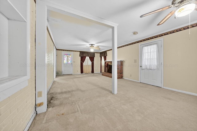 3209 Elm St, Adamsville, AL 35005 - unfurnished living room with a ceiling fan, carpet floors, plenty of natural light, and ornamental molding