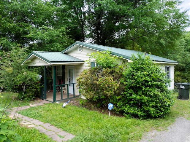 2701 Preston Ave, Jasper, AL 35501 - view of front of house with metal roof and covered porch