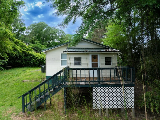 2701 Preston Ave, Jasper, AL 35501 - rear view of property with a yard, a deck, and stairs
