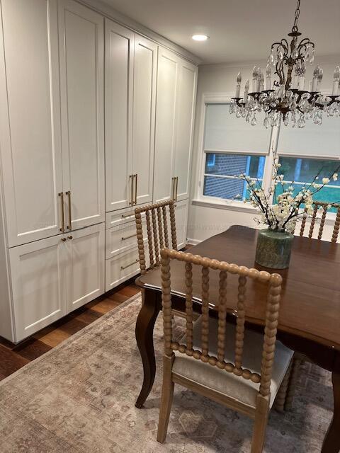 3111 18th Ave, Haleyville, AL 35565 - dining space featuring dark wood-type flooring, a chandelier, and recessed lighting