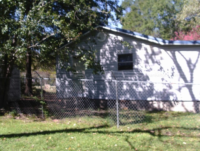 2665 Holly Rd, Jasper, AL 35501 - view of home's exterior with fence and a yard