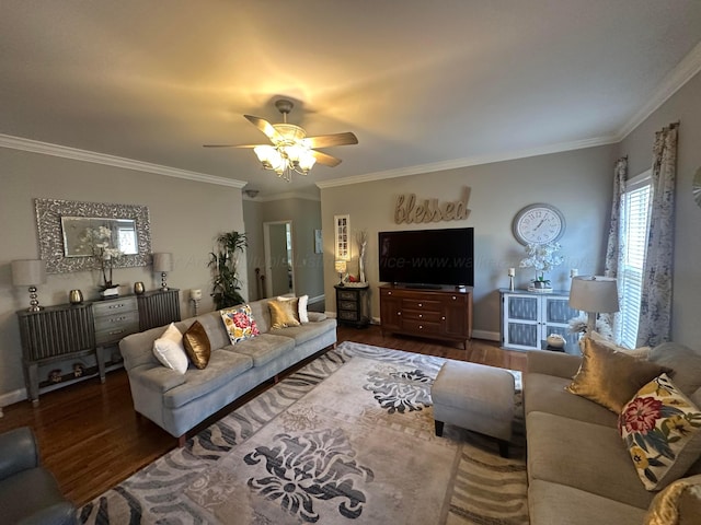 living area featuring dark wood finished floors, ceiling fan, crown molding, and baseboards
