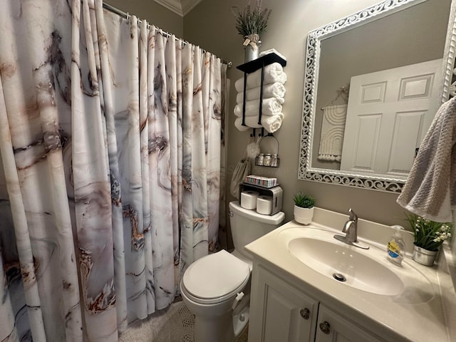 bathroom with toilet, ornamental molding, vanity, and curtained shower