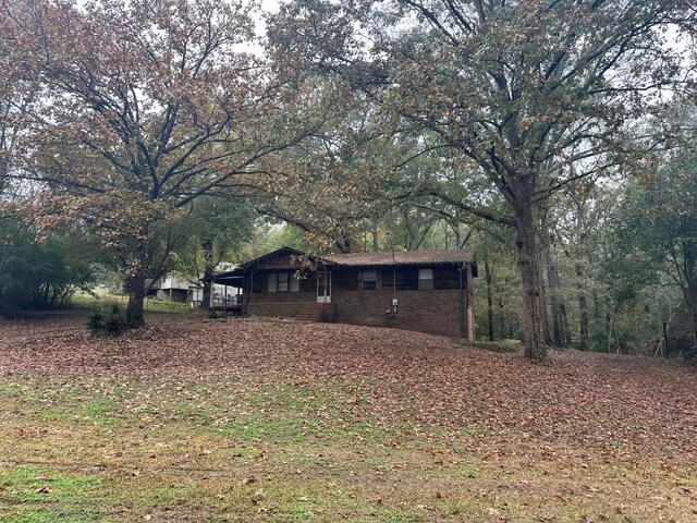 47 Hyche Rd, Cordova, AL 35550 - view of front of home featuring stone siding