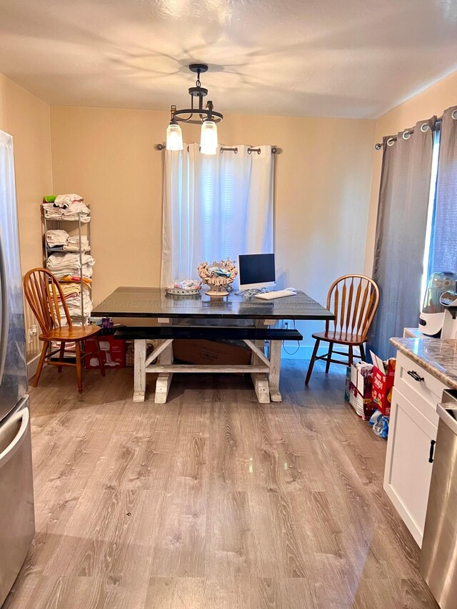 2804 Calumet Rd, Jasper, AL 35501 - dining room featuring a notable chandelier and light wood-type flooring