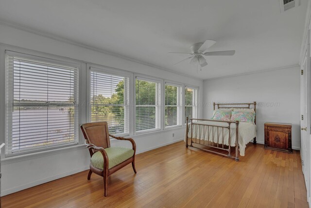 60 County Road 304, Cullman, AL 35057 - bedroom featuring light wood-type flooring, crown molding, and a ceiling fan