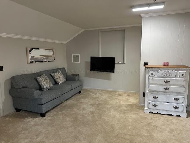 carpeted living room featuring visible vents, crown molding, and vaulted ceiling